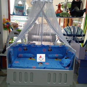 Baby cot with mattress, mosquito net and cot bumper